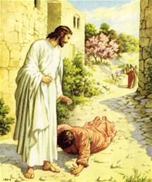 Imand ligt aan de voeten van jezus en smeekt om genade